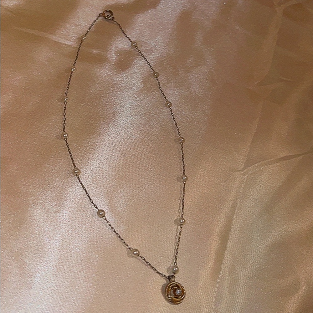 Francesca’s gold Pearl necklace